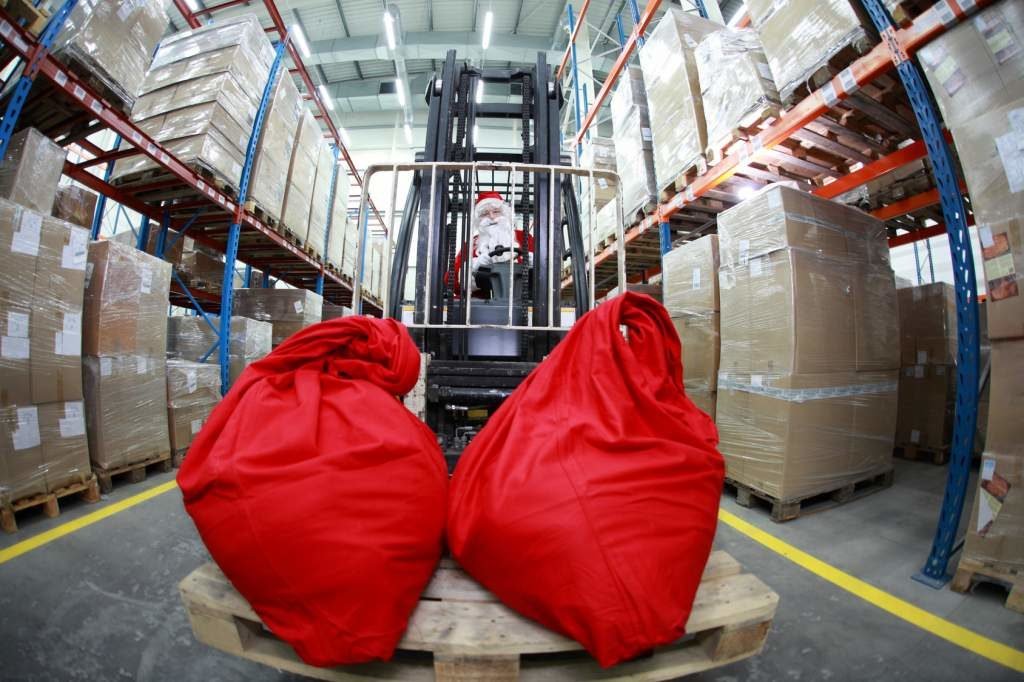 Santa Claus, forklift, red sacks, Christmas is coming, warehouse, storehouse, logistics, workplace safety, holiday safety concerns at work